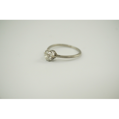 218 - A platinum? and solitaire diamond set ring, the stone weighing approximately 0.90ct, size P/P, gross... 