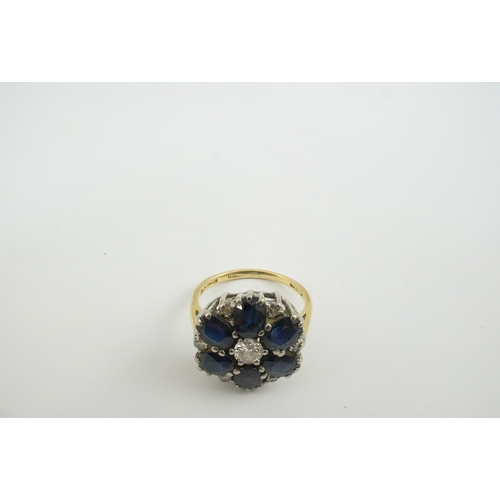 221 - A 1970's 18ct gold, sapphire and diamond set circular cluster ring, size K/L, gross weight 5.1 grams... 