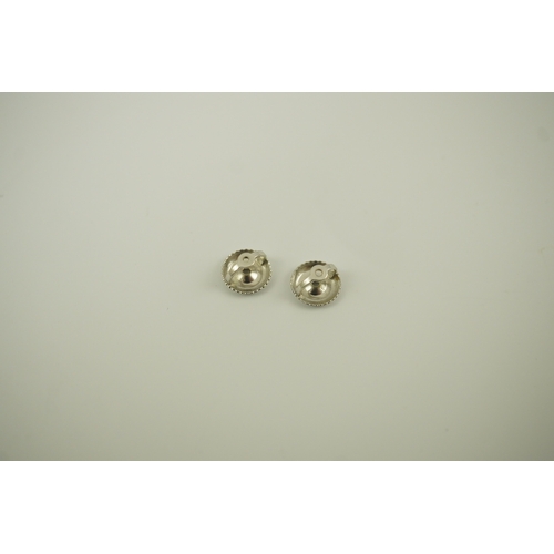 223 - A pair of 14k white gold and solitaire diamond set ear studs, the stones diameter approximately 4.7m... 