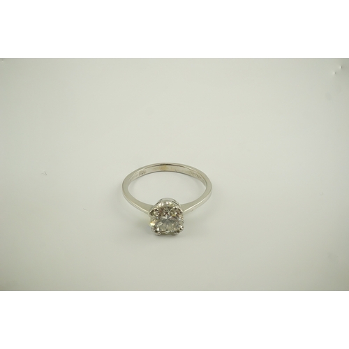 224 - An 18ct white gold and solitaire diamond set ring, the round cut stone weighing approximately 0.80ct... 