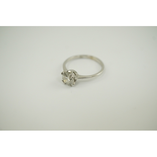 224 - An 18ct white gold and solitaire diamond set ring, the round cut stone weighing approximately 0.80ct... 