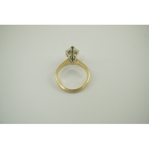 226 - A modern 14k gold and solitaire marquise diamond set ring, the stone weighing approximately 2.75cts,... 