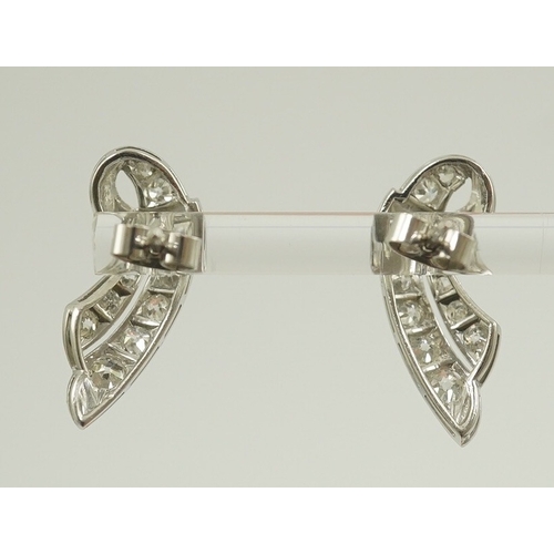 227 - A pair of 18ct white gold and millegrain set diamond cluster scroll earrings, 21mm, gross weight 4.6... 