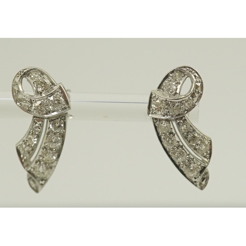 227 - A pair of 18ct white gold and millegrain set diamond cluster scroll earrings, 21mm, gross weight 4.6... 