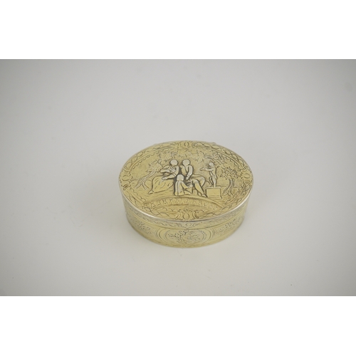 23 - A 19th century Continental silver gilt oval snuff box, embossed with foliage, the cover with figures... 