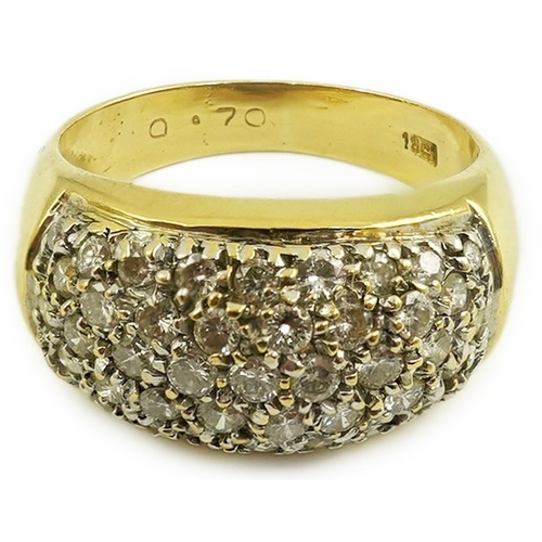 234 - A modern 18k gold and diamond cluster set domed ring, size J/K, gross weight 6.4 grams.