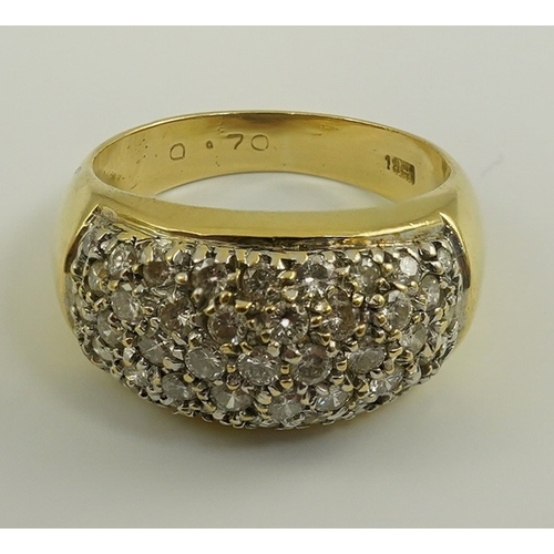 234 - A modern 18k gold and diamond cluster set domed ring, size J/K, gross weight 6.4 grams.