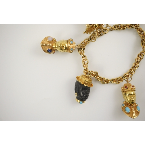 243 - A late 20th century Italian 18k gold charm bracelet, hung with six assorted Italian 18k gold and gem... 