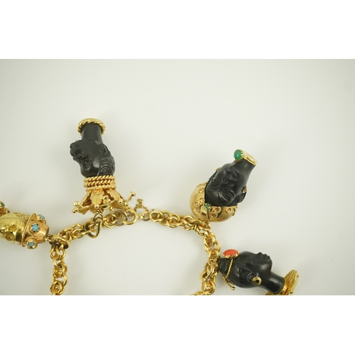 243 - A late 20th century Italian 18k gold charm bracelet, hung with six assorted Italian 18k gold and gem... 