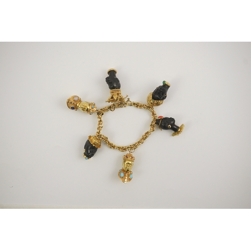 243 - A late 20th century Italian 18k gold charm bracelet, hung with six assorted Italian 18k gold and gem... 