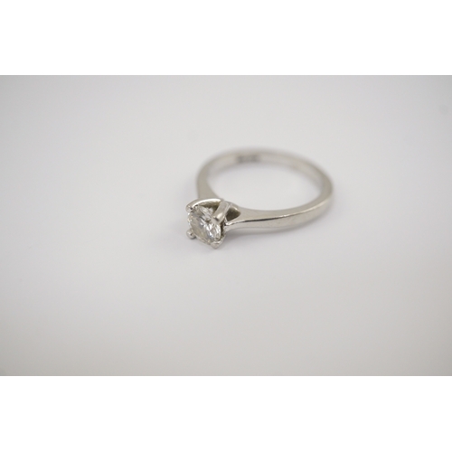 244 - A modern platinum and solitaire diamond set ring, with an accompanying GIA report dated 13/12/2011, ... 