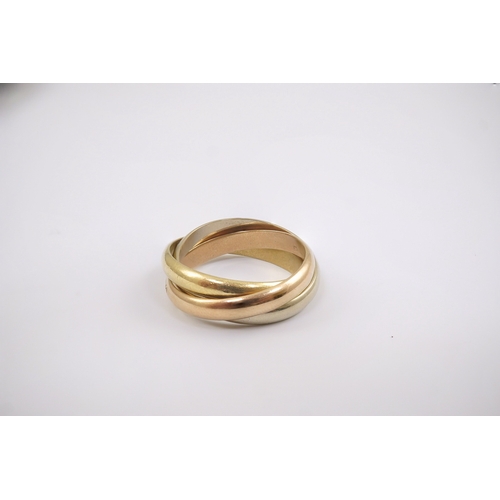 245 - A modern Must De Cartier three colour 18k gold triple band 'Russian' wedding ring, signed and number... 