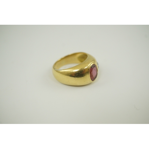 251 - A modern Mappin & Webb 18ct gold and gypsy set pink tourmaline and blue sapphire set dress ring, siz... 