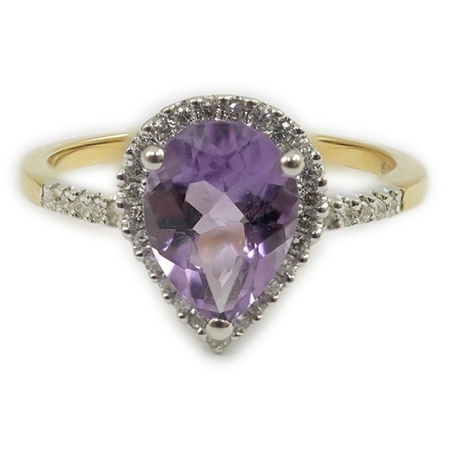 256 - A modern 18ct gold and single stone pear cut amethyst set ring, with diamond chip set border and sho... 