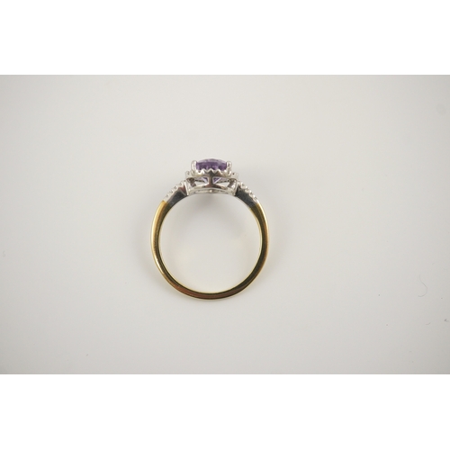 256 - A modern 18ct gold and single stone pear cut amethyst set ring, with diamond chip set border and sho... 