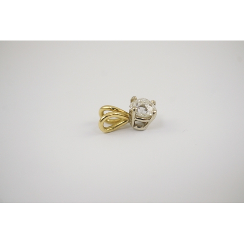 258 - A gold and solitaire diamond set small pendant, the old cut stone weighing approximately 0.80ct, ove... 