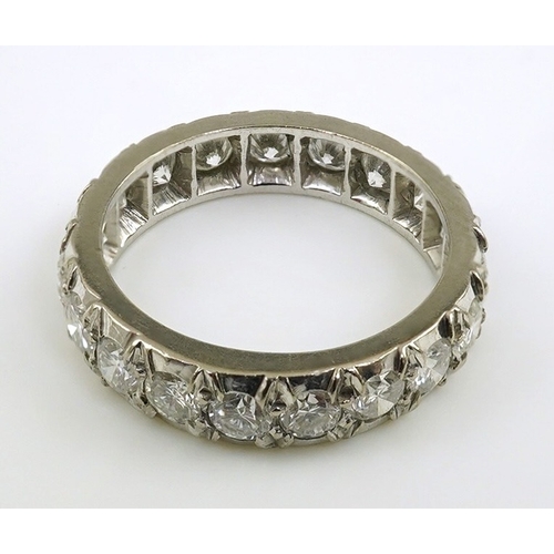 259 - A platinum? and nineteen stone illusion set diamond full eternity ring, size M, gross weight 4.7 gra... 