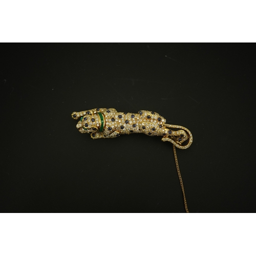 266 - A modern Cartier style 18k gold, sapphire, emerald and diamond cluster set stalking panther brooch, ... 