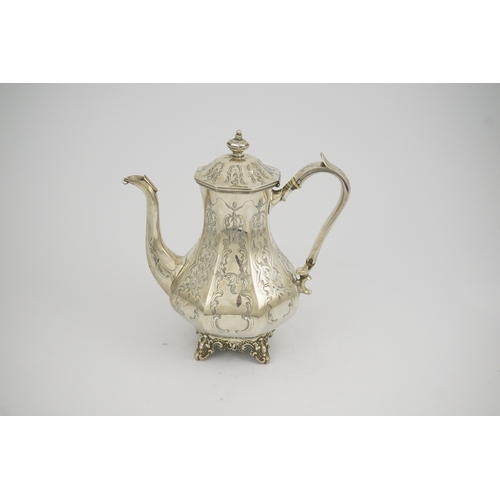 27 - A Victorian engraved silver coffee pot, by John Welby, of octagonal baluster form, on four scroll fe... 