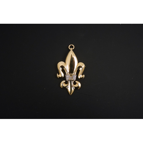 272 - A modern 14k gold and diamond chip cluster set fleur de lys pendant, 37mm, gross weight 5.3 grams, t... 