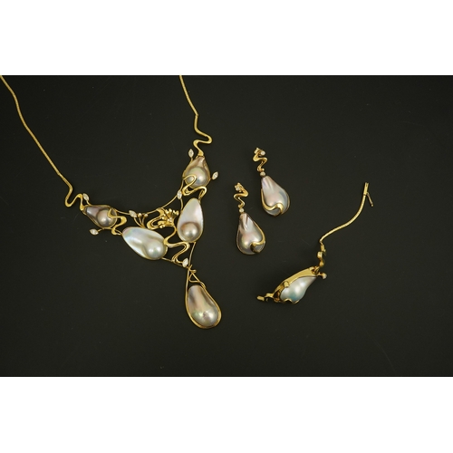 276 - A modern suite of 18k gold, baroque pear, round and marquise diamond set jewellery, comprising a nec... 