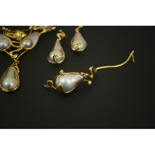 276 - A modern suite of 18k gold, baroque pear, round and marquise diamond set jewellery, comprising a nec... 