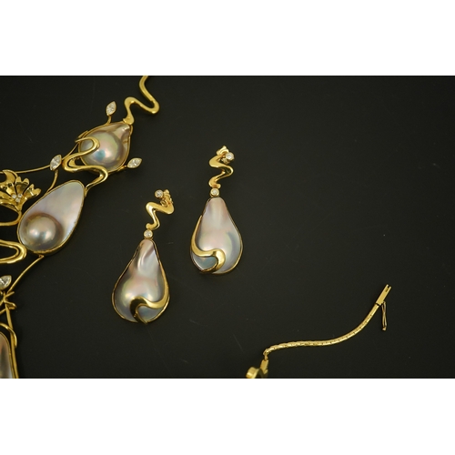 276 - A modern suite of 18k gold, baroque pear, round and marquise diamond set jewellery, comprising a nec... 