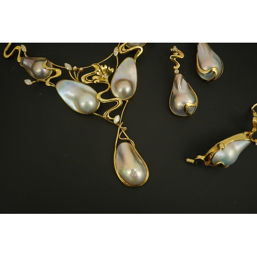 276 - A modern suite of 18k gold, baroque pear, round and marquise diamond set jewellery, comprising a nec... 