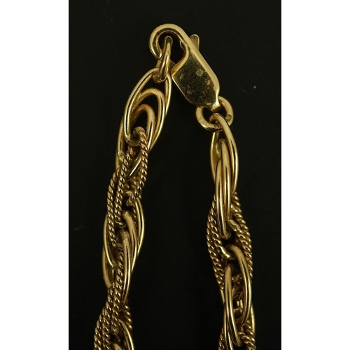 278 - A modern 9ct gold multi oval link interwoven necklace, 48cm, 24.9 grams.