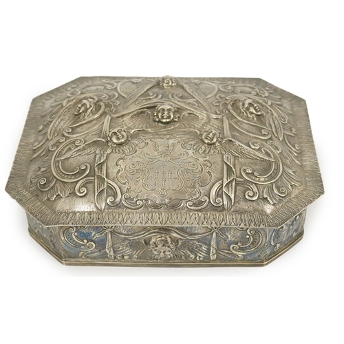 3 - A 17th century style Continental silver casket, embossed with Reynold's Angels amongst scrolls and e... 