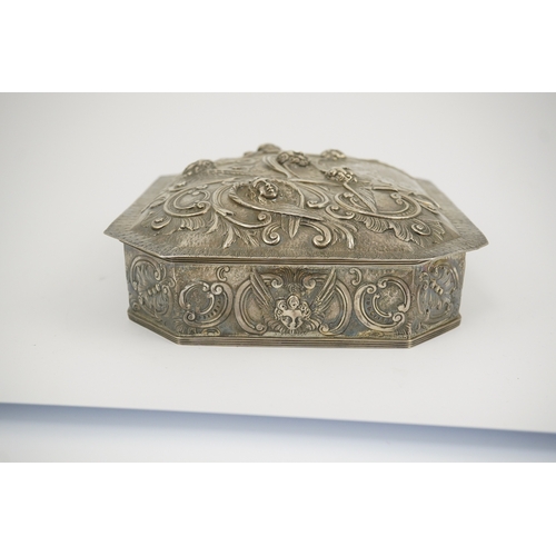 3 - A 17th century style Continental silver casket, embossed with Reynold's Angels amongst scrolls and e... 