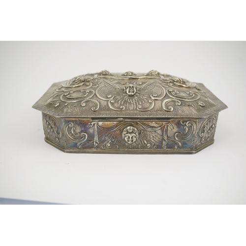 3 - A 17th century style Continental silver casket, embossed with Reynold's Angels amongst scrolls and e... 