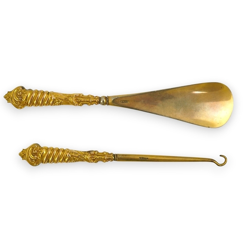 34 - A cased late Victorian 9ct gold handled shoe horn and button hook set, makers, M & A, Birmingham, 18... 