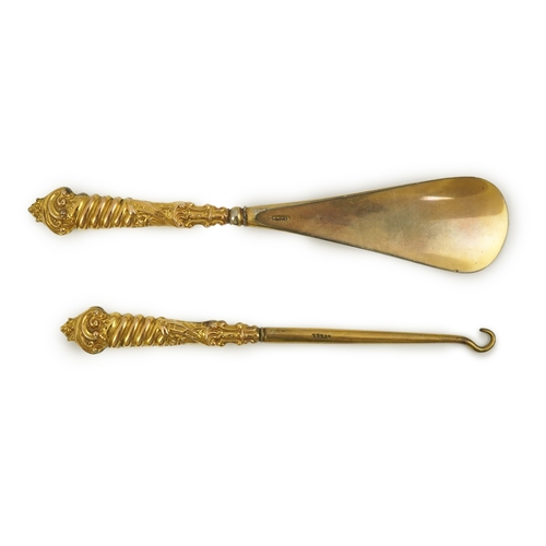 34 - A cased late Victorian 9ct gold handled shoe horn and button hook set, makers, M & A, Birmingham, 18... 