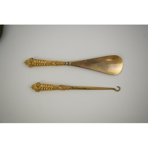 34 - A cased late Victorian 9ct gold handled shoe horn and button hook set, makers, M & A, Birmingham, 18... 