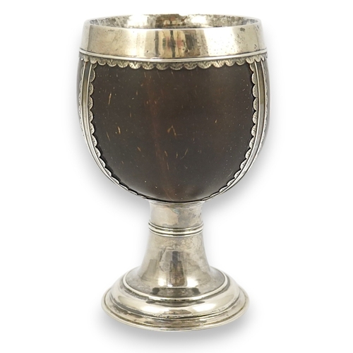 4 - A late George I? silver mounted coconut cup, makers mark only, possible Samuel Eaton, London, with t... 