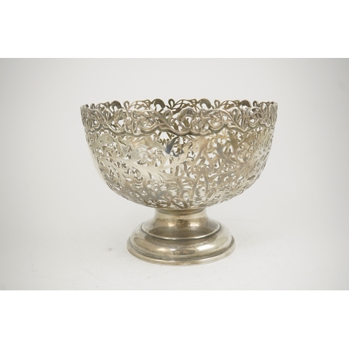 40 - A large Edwardian pierced silver circular bowl, by James Deakin & Sons Ltd, of foliate design, with ... 