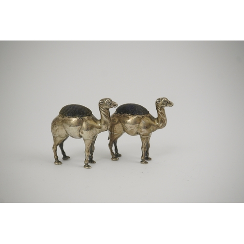 43 - A pair of Edwardian novelty silver pin cushions, each modelled as a camel, by Adie & Lovekin Ltd, Bi... 