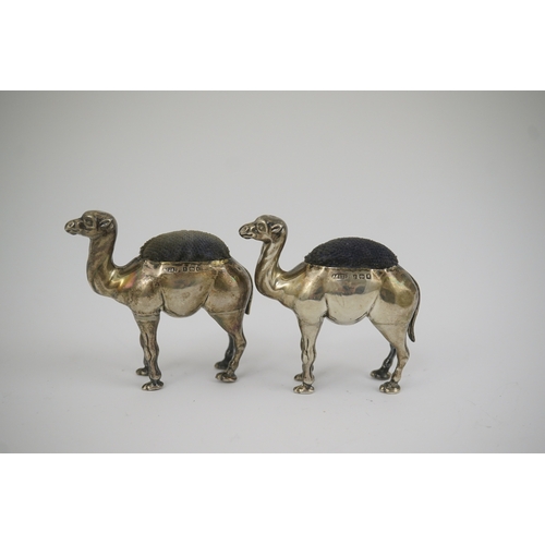 43 - A pair of Edwardian novelty silver pin cushions, each modelled as a camel, by Adie & Lovekin Ltd, Bi... 