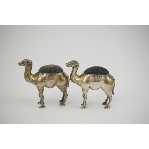 43 - A pair of Edwardian novelty silver pin cushions, each modelled as a camel, by Adie & Lovekin Ltd, Bi... 