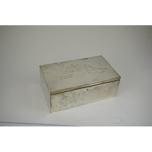 44 - A large Edwardian silver rectangular cigar box, by Mappin & Webb, with later engraved presentation i... 