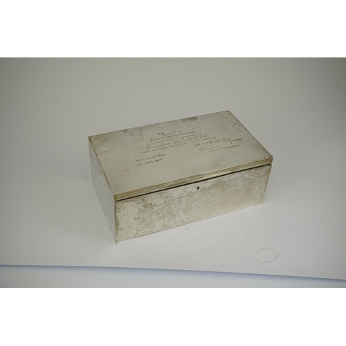 44 - A large Edwardian silver rectangular cigar box, by Mappin & Webb, with later engraved presentation i... 