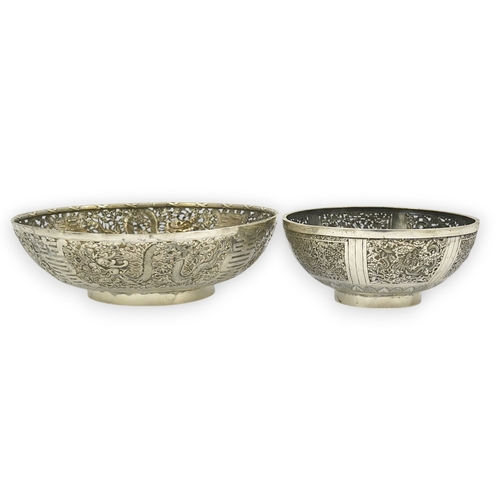 45 - Two early 20th century Chinese Export pierced silver circular bowls, decorated with dragons and chry... 