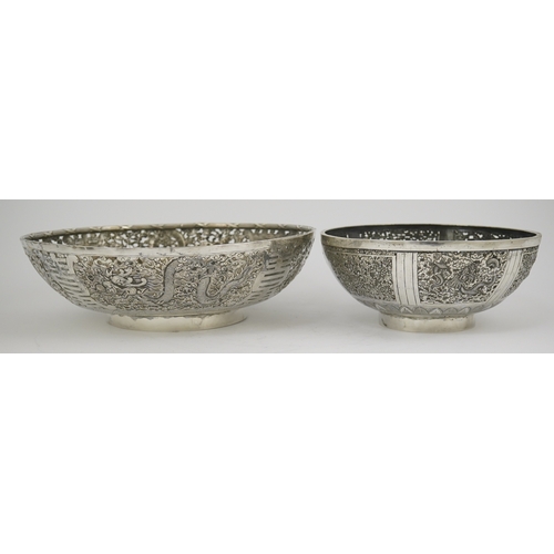 45 - Two early 20th century Chinese Export pierced silver circular bowls, decorated with dragons and chry... 