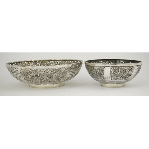 45 - Two early 20th century Chinese Export pierced silver circular bowls, decorated with dragons and chry... 