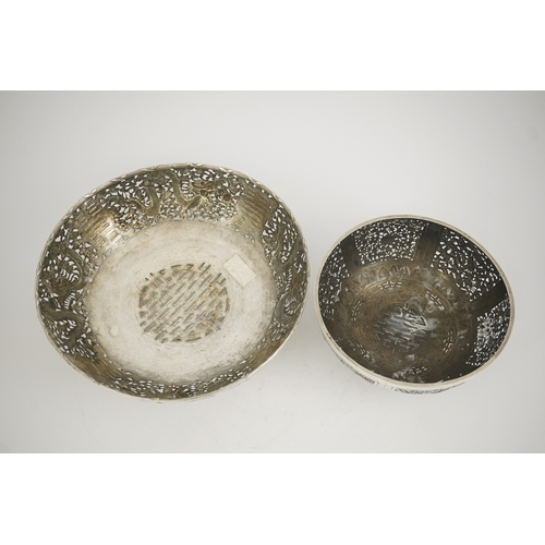 45 - Two early 20th century Chinese Export pierced silver circular bowls, decorated with dragons and chry... 