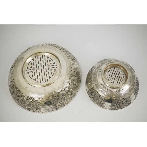 45 - Two early 20th century Chinese Export pierced silver circular bowls, decorated with dragons and chry... 