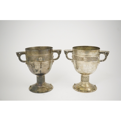 52 - A pair of late Victorian Arts & Crafts Celtic style silver two handled presentation pedestal trophy ... 