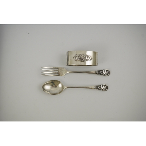 53 - A 1930's Arts & Crafts Liberty & Co cased silver three piece christening set, comprising a spoon, fo... 