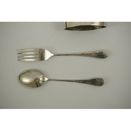 53 - A 1930's Arts & Crafts Liberty & Co cased silver three piece christening set, comprising a spoon, fo... 